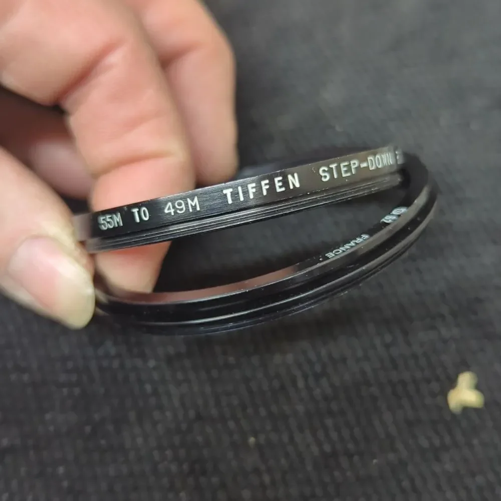 collection of camera lens filters, likely used‎ for photography